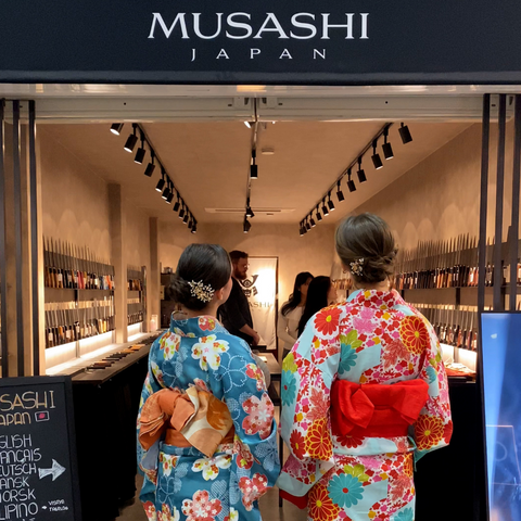 Tourists in kimono in front of Musashi Japan Store